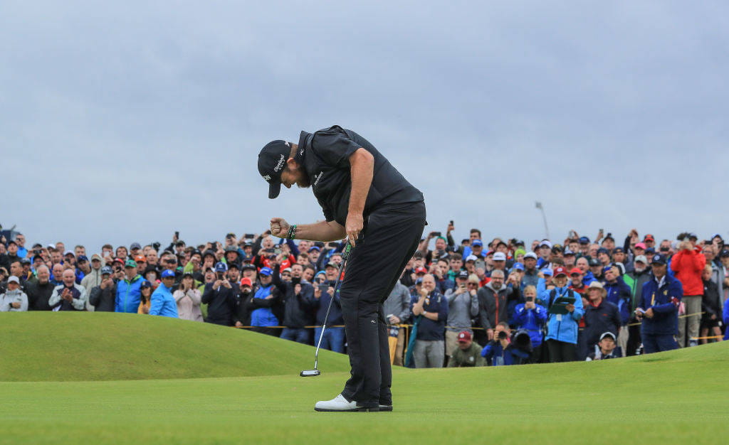Shane Lowry celebrates a key putt on Royal Portrush
